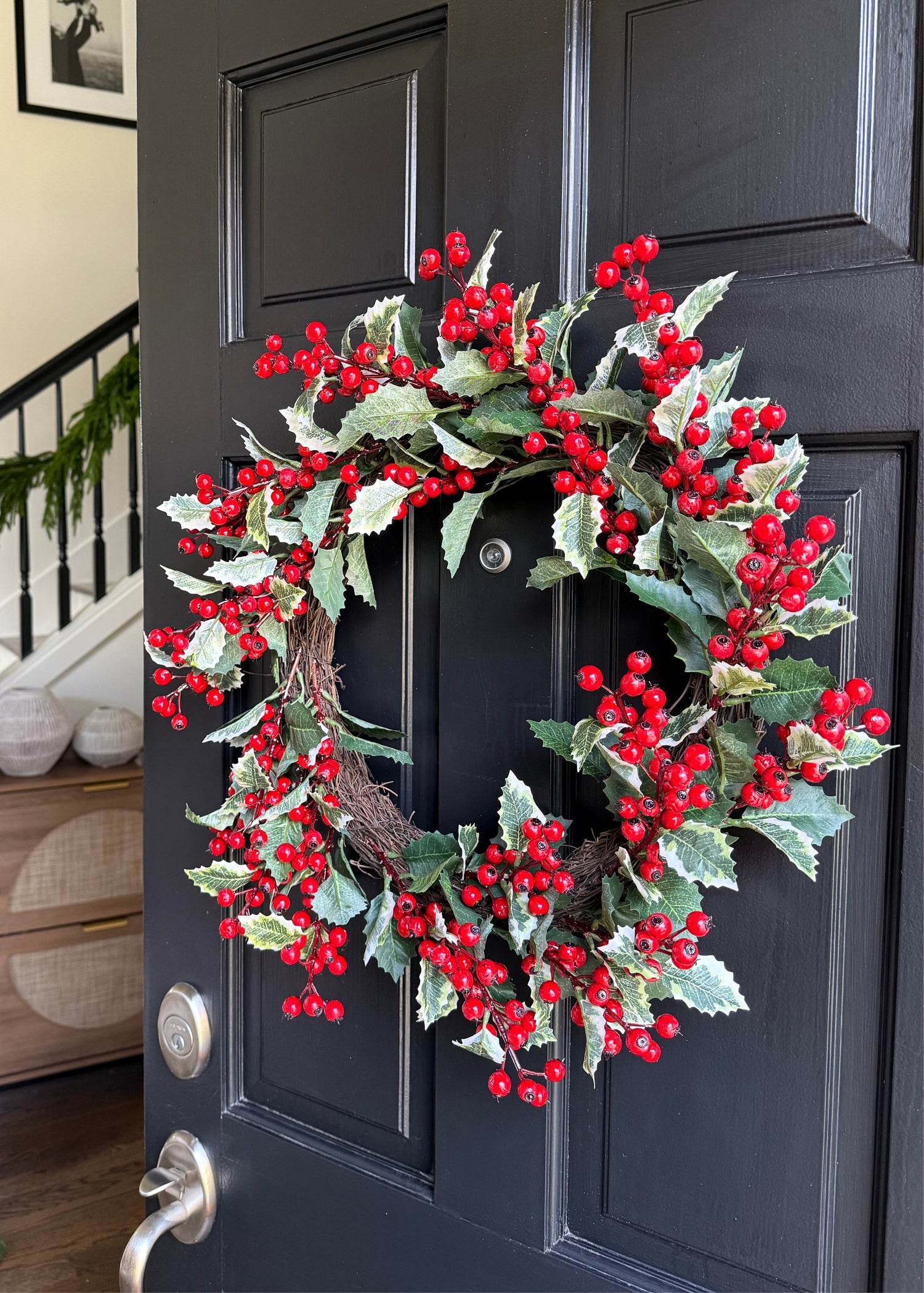 Traditional Holly and Berry Wreath on Black Front Door