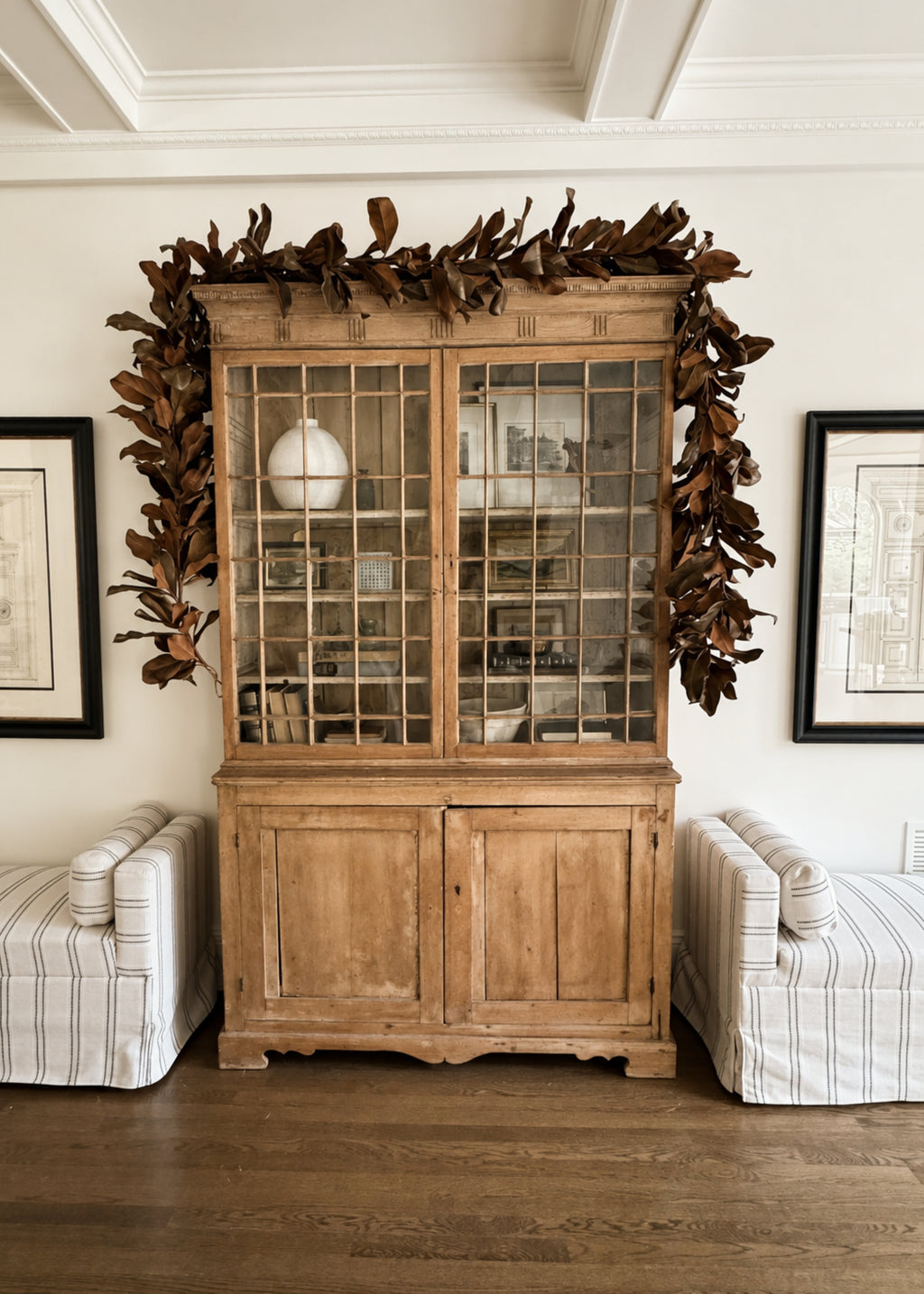 Magnolia Garland Decorating a Cabinet