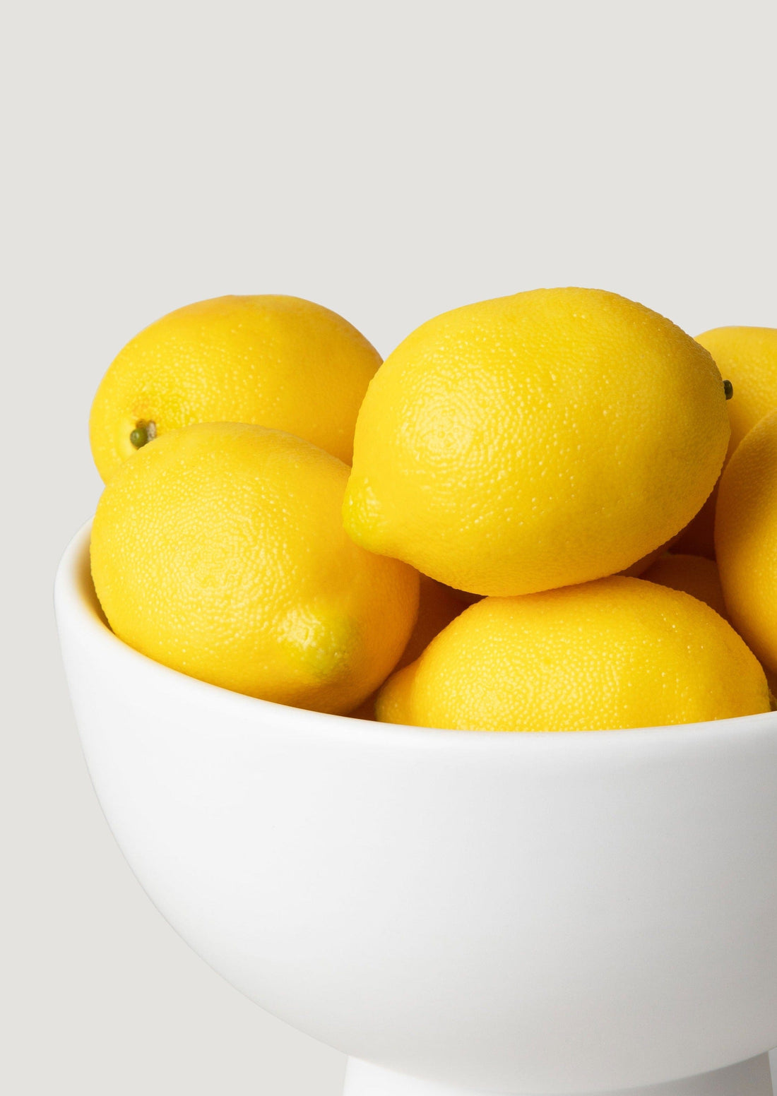 Artificial Lemons in Bowl