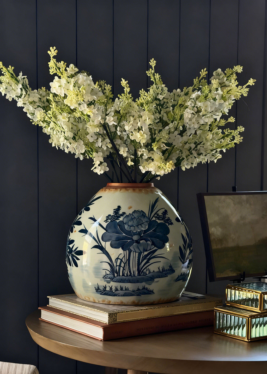Decorative ginger jar with faux lilac arrangement