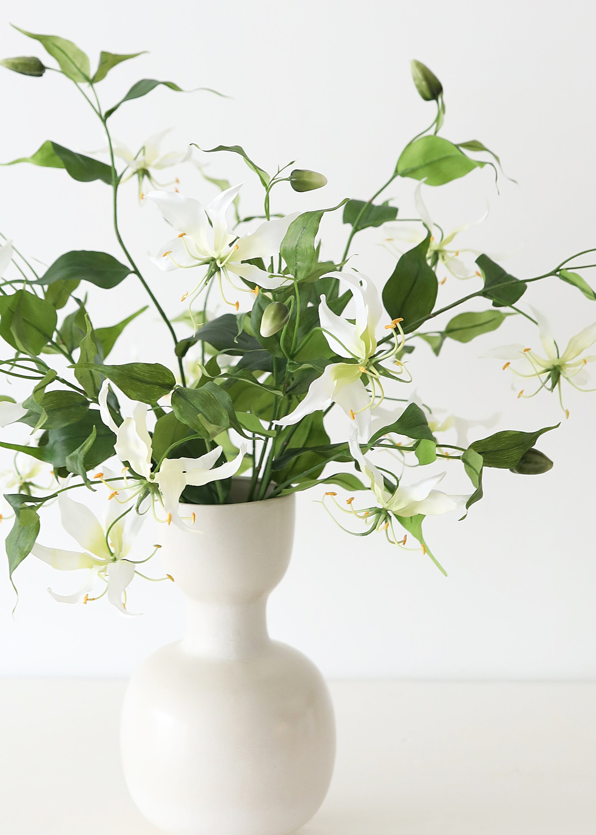  Gloriosa Lilies Arranged in a Vase