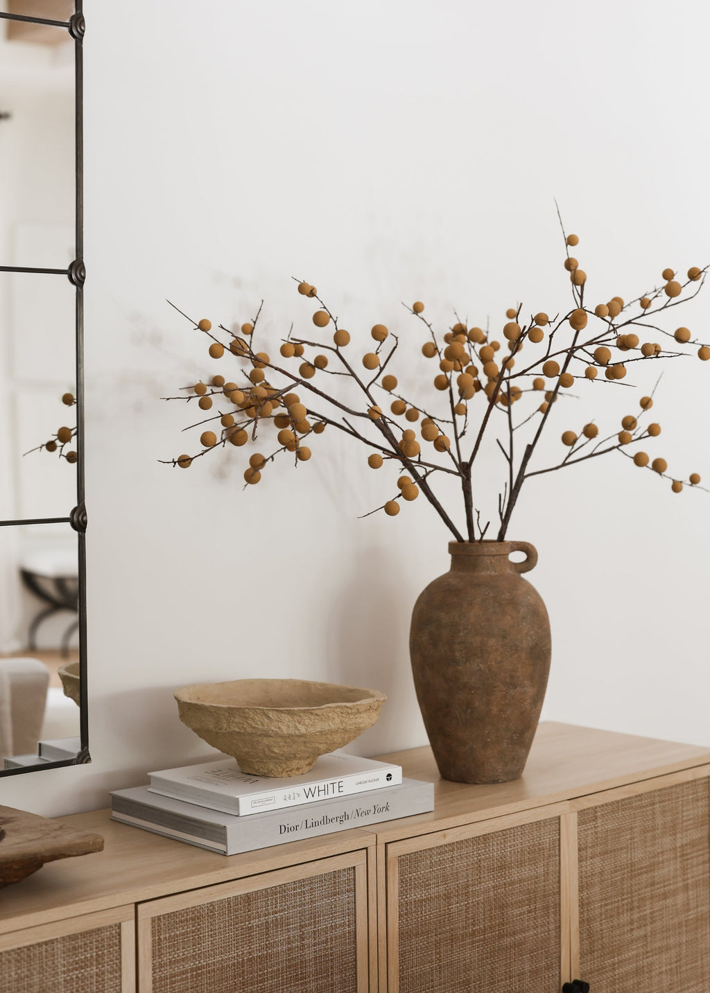 Decorative vase of faux longan branches