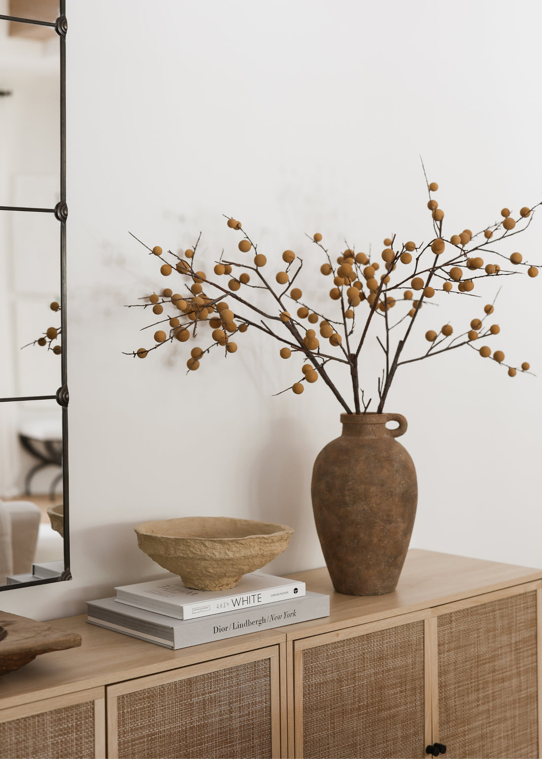 Decorative vase of faux longan branches