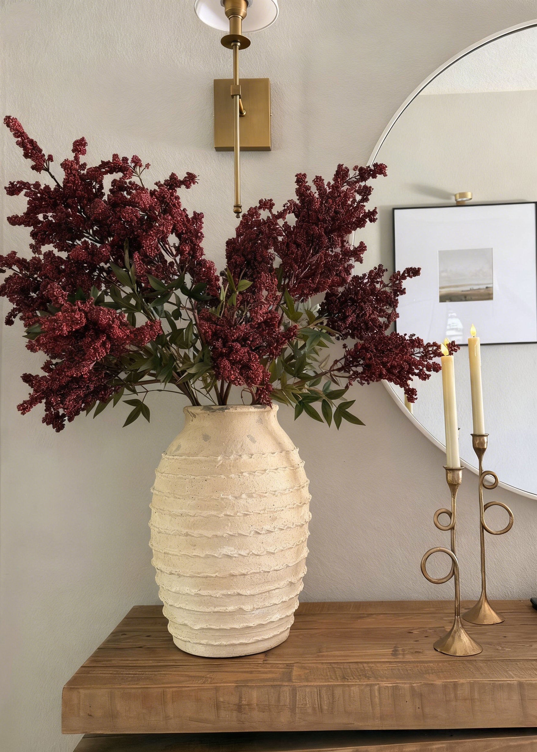 Decorative vase with burgundy Nandina berries