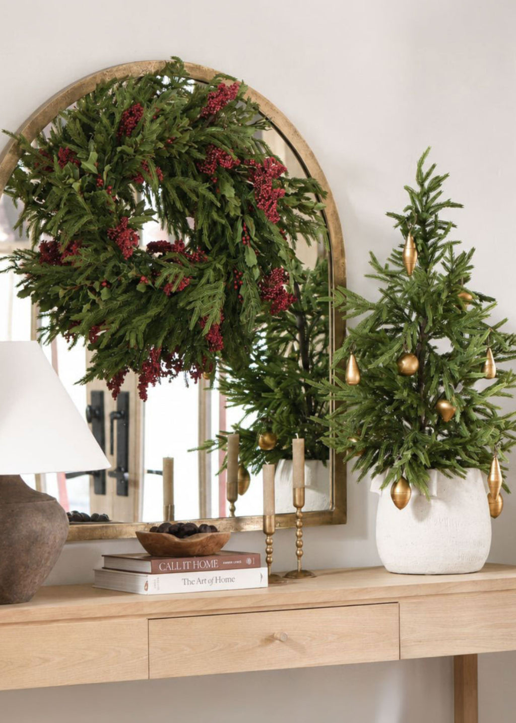 norfolk pine wreath and tree decorated for the holidays