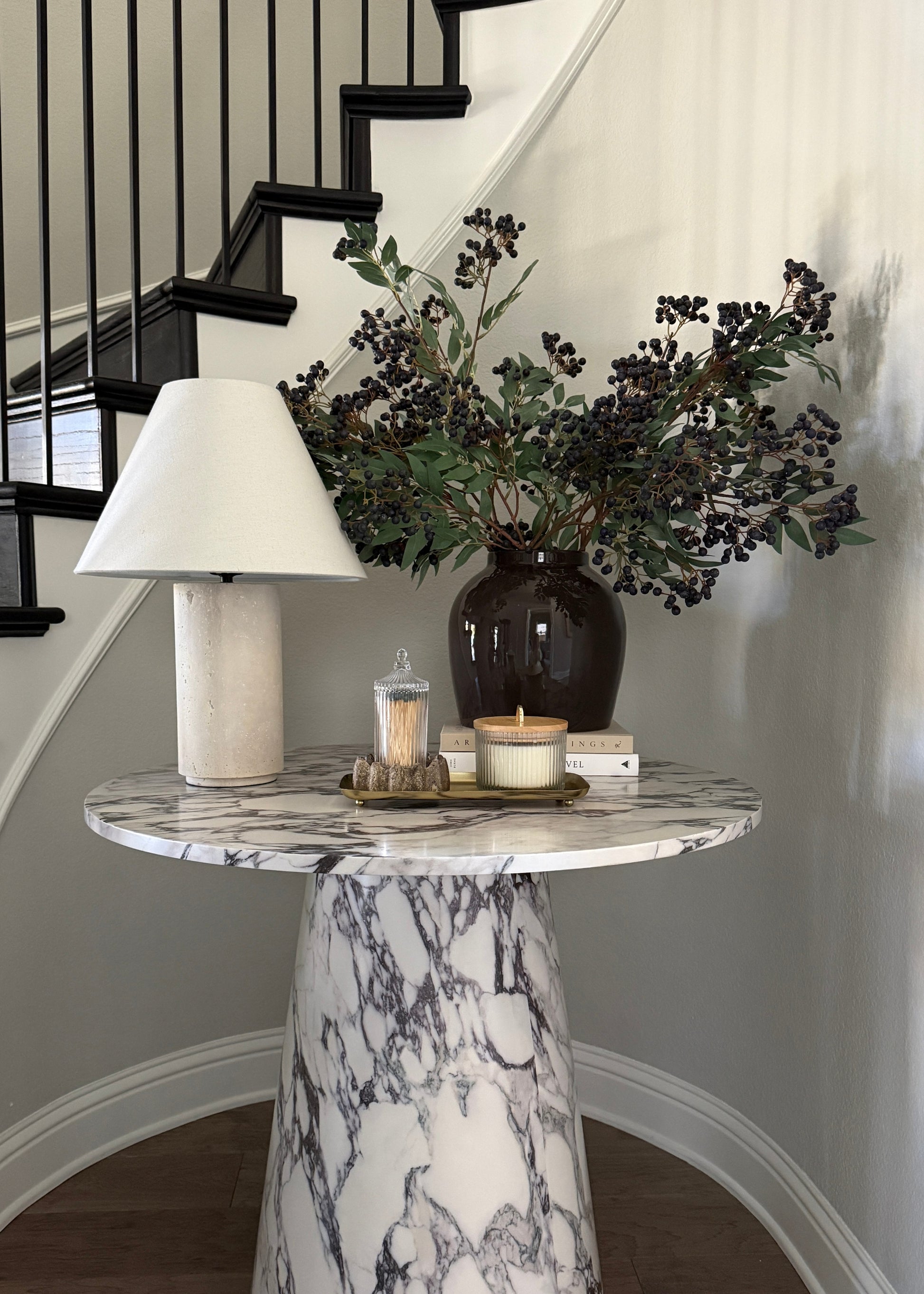 Artificial Pepperberry Branches Arranged in a Glossy Slate Vase on a Marble Table