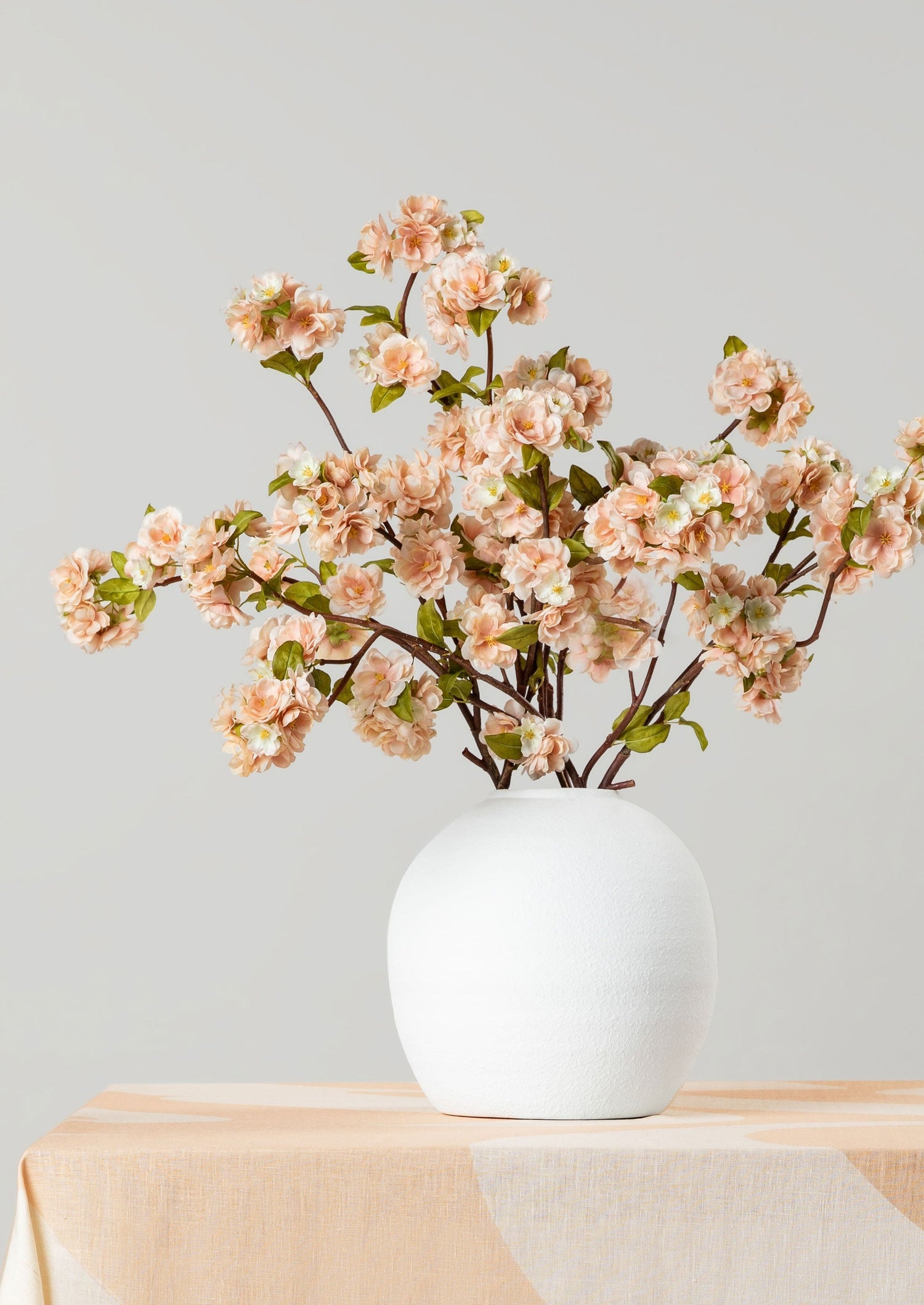 Konos Vase with Artificial Peach Blossom Arrangement