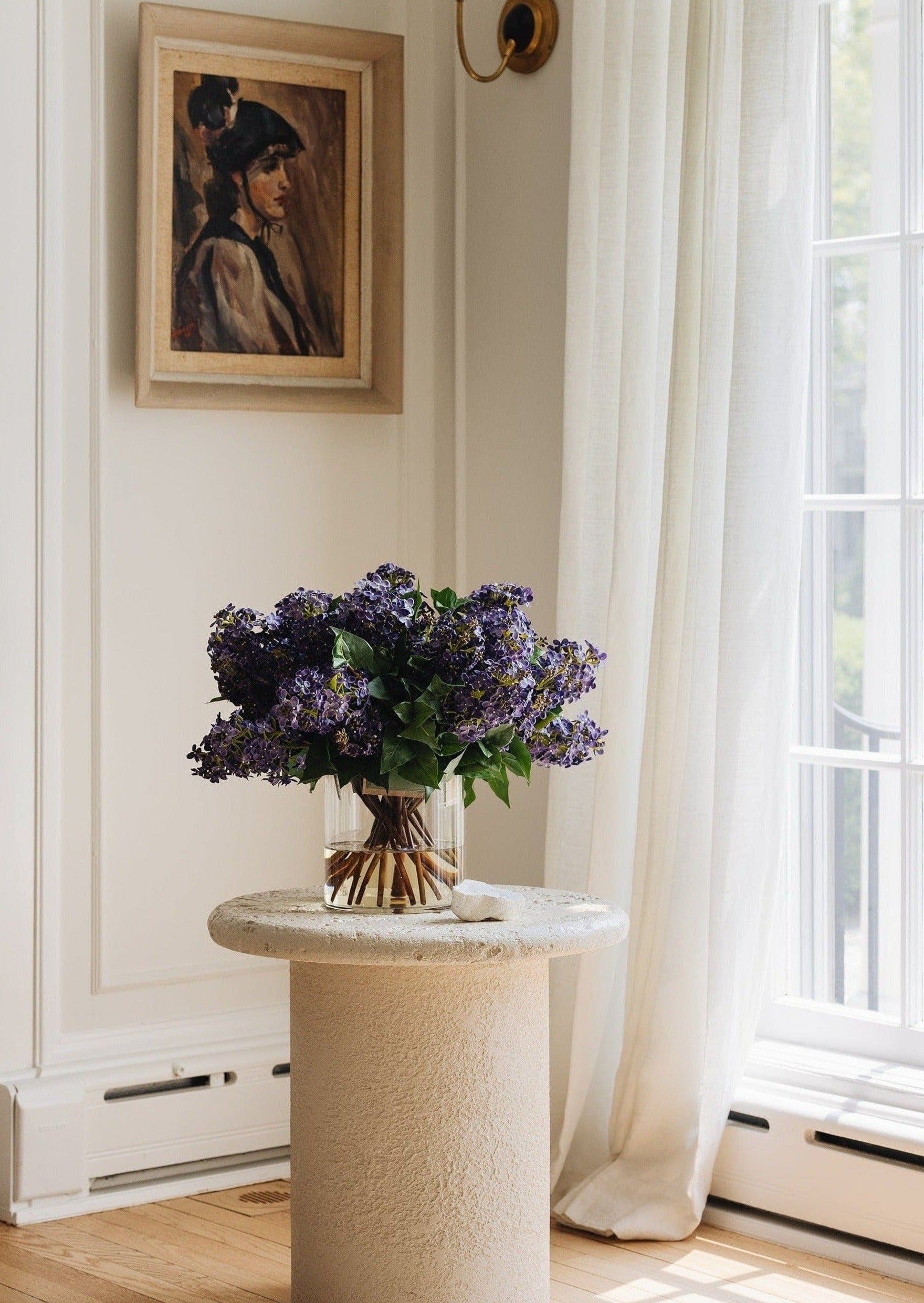 Video of Purple Faux Lilac Floral Arrangement in Glass Vase