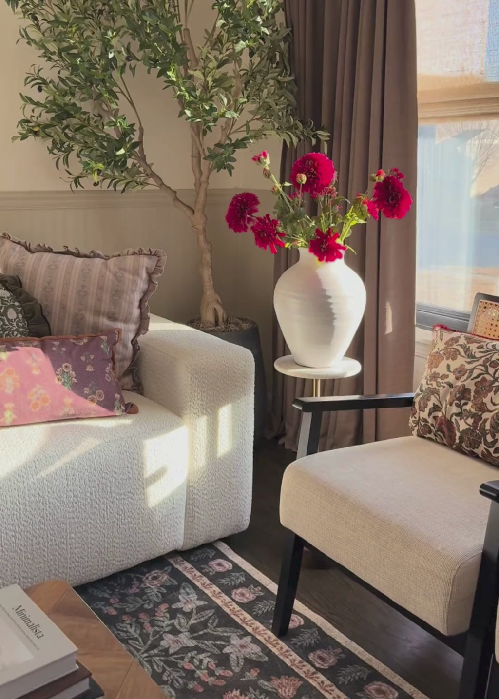 zinnea flower arrangement in a white vase
