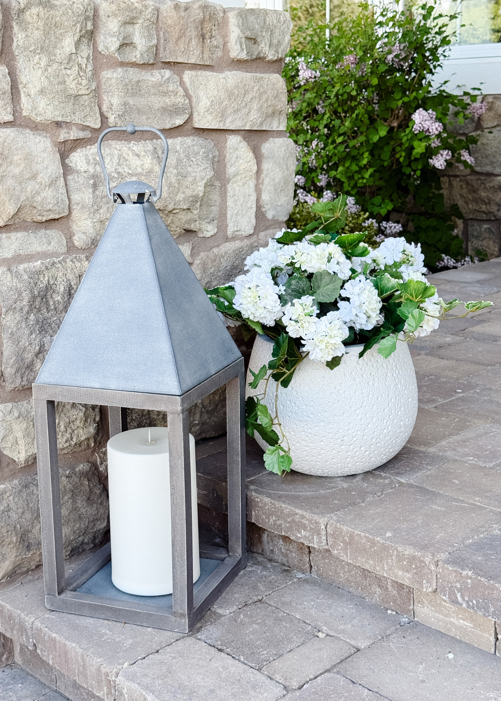 Outdoor Geraniums Styled on a Front Porch