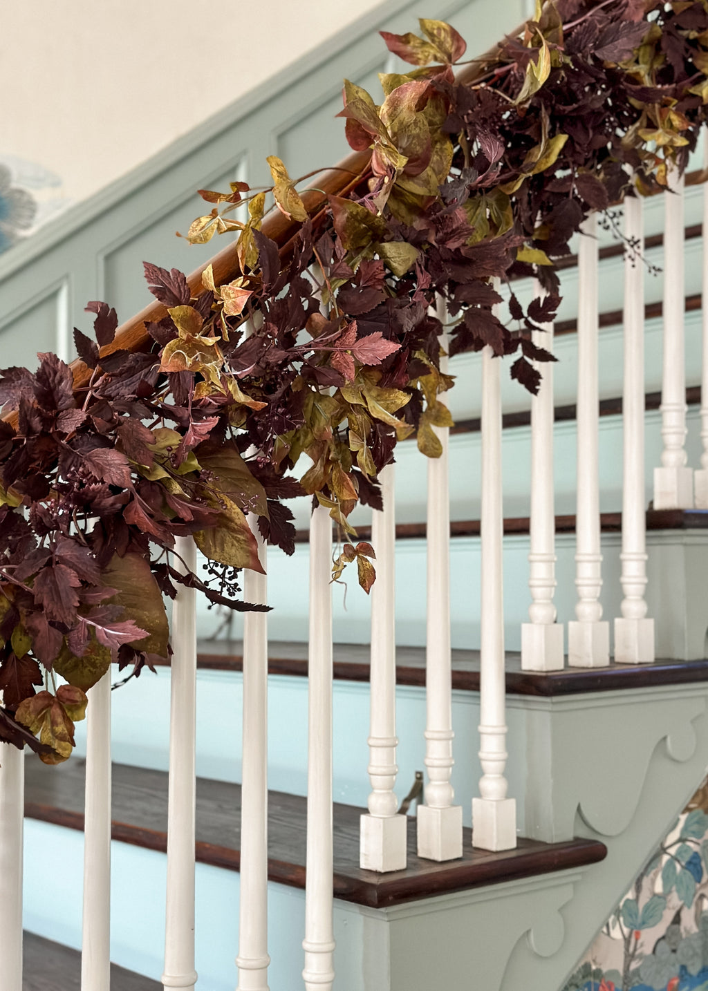 video of cimicifuga and grape ivy garland on stairway