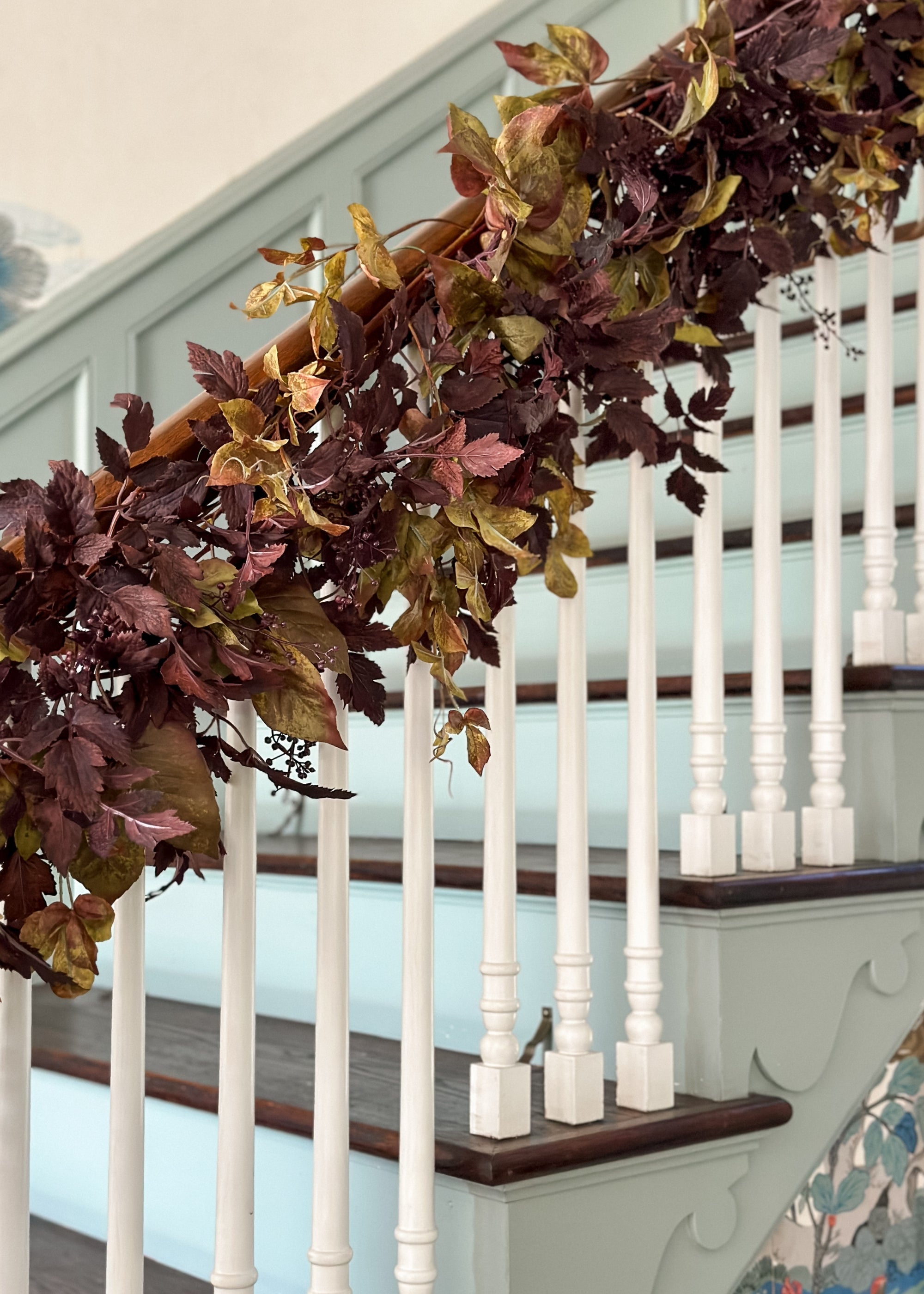 video of cimicifuga and grape ivy garland on stairway