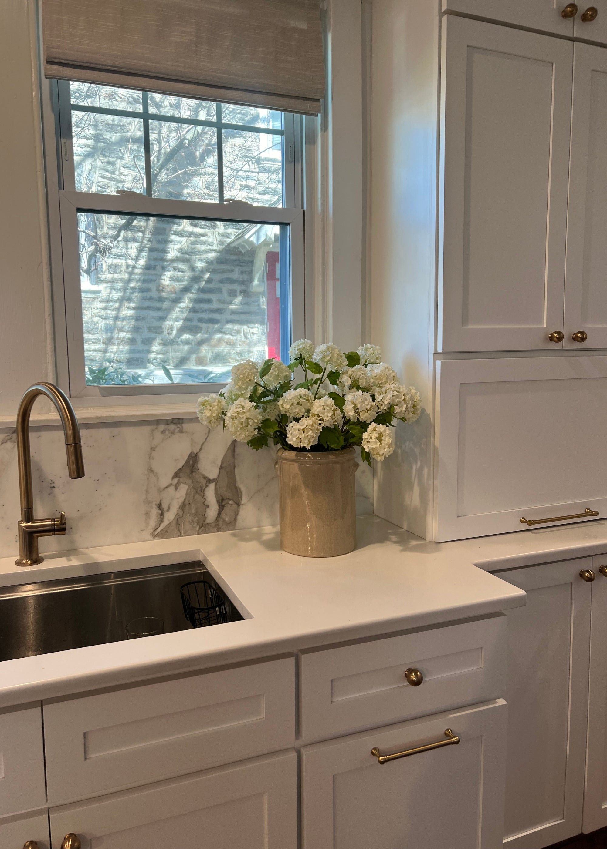 Arrangement of Snowballs in a Kitchen
