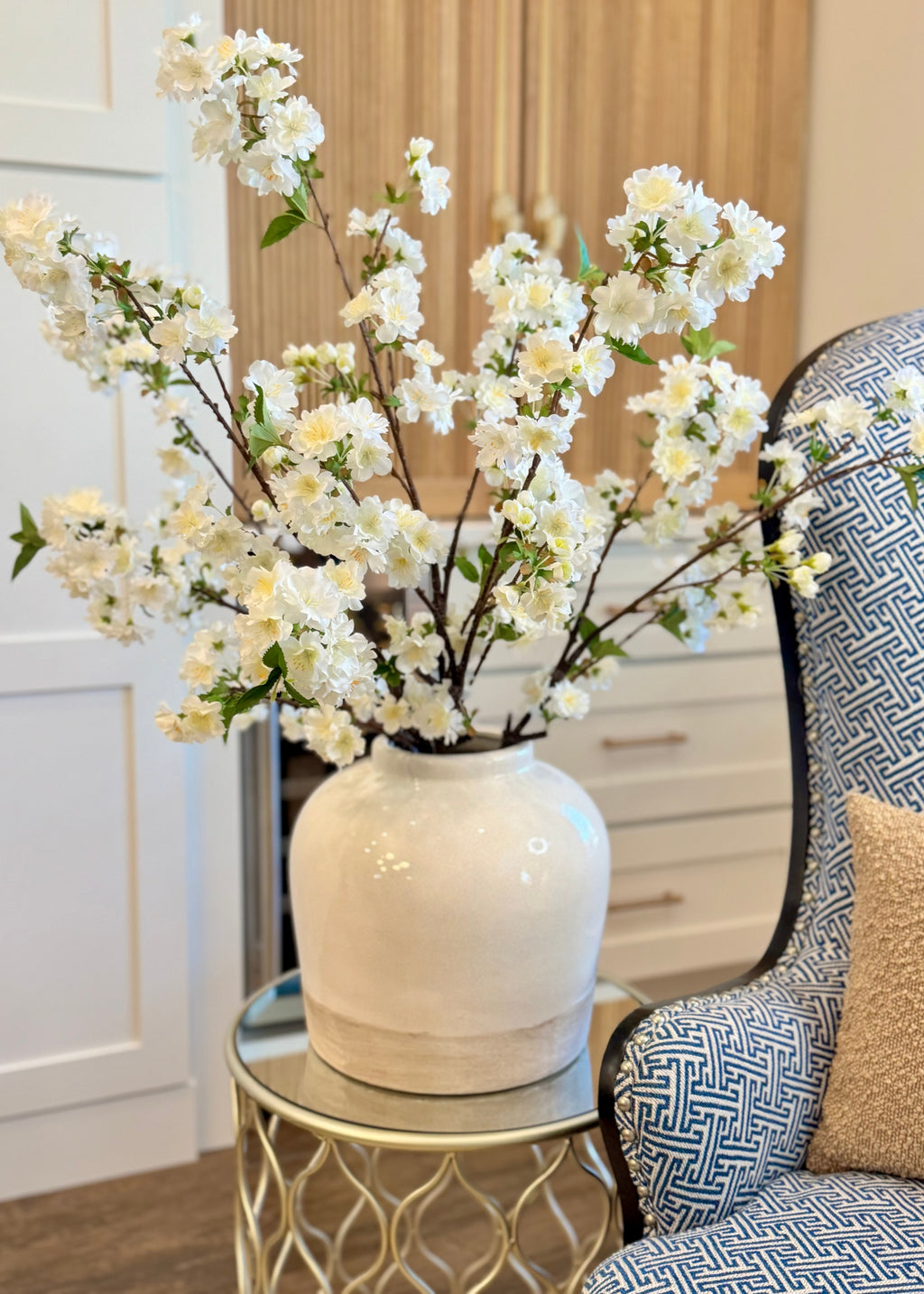 designing with cream white cherry blossom stems