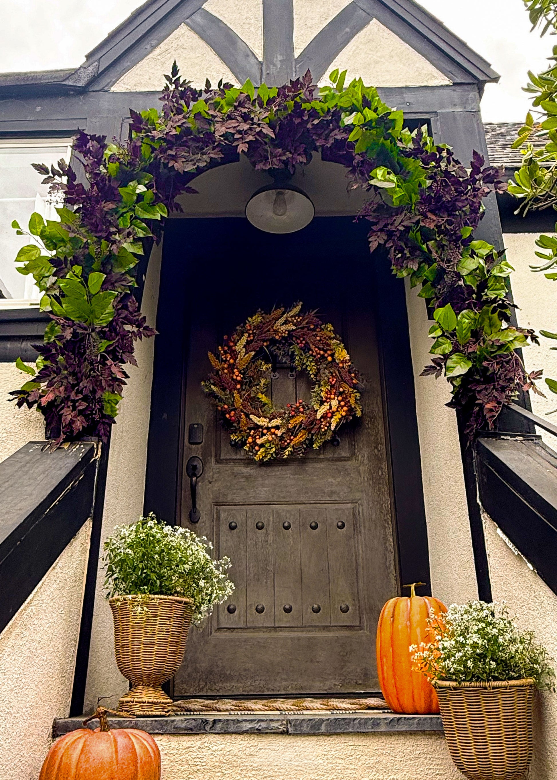 Styling your door for fall with salal and cimicifuga garlands and a fall wreath