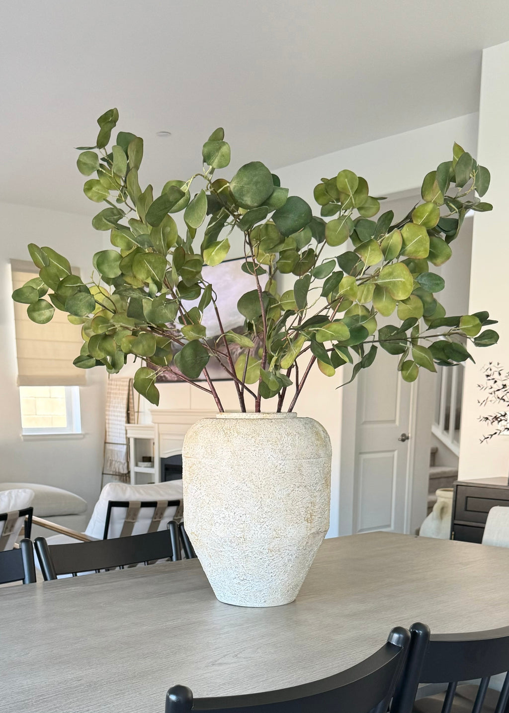 video of faux eucalyptus styled in vase