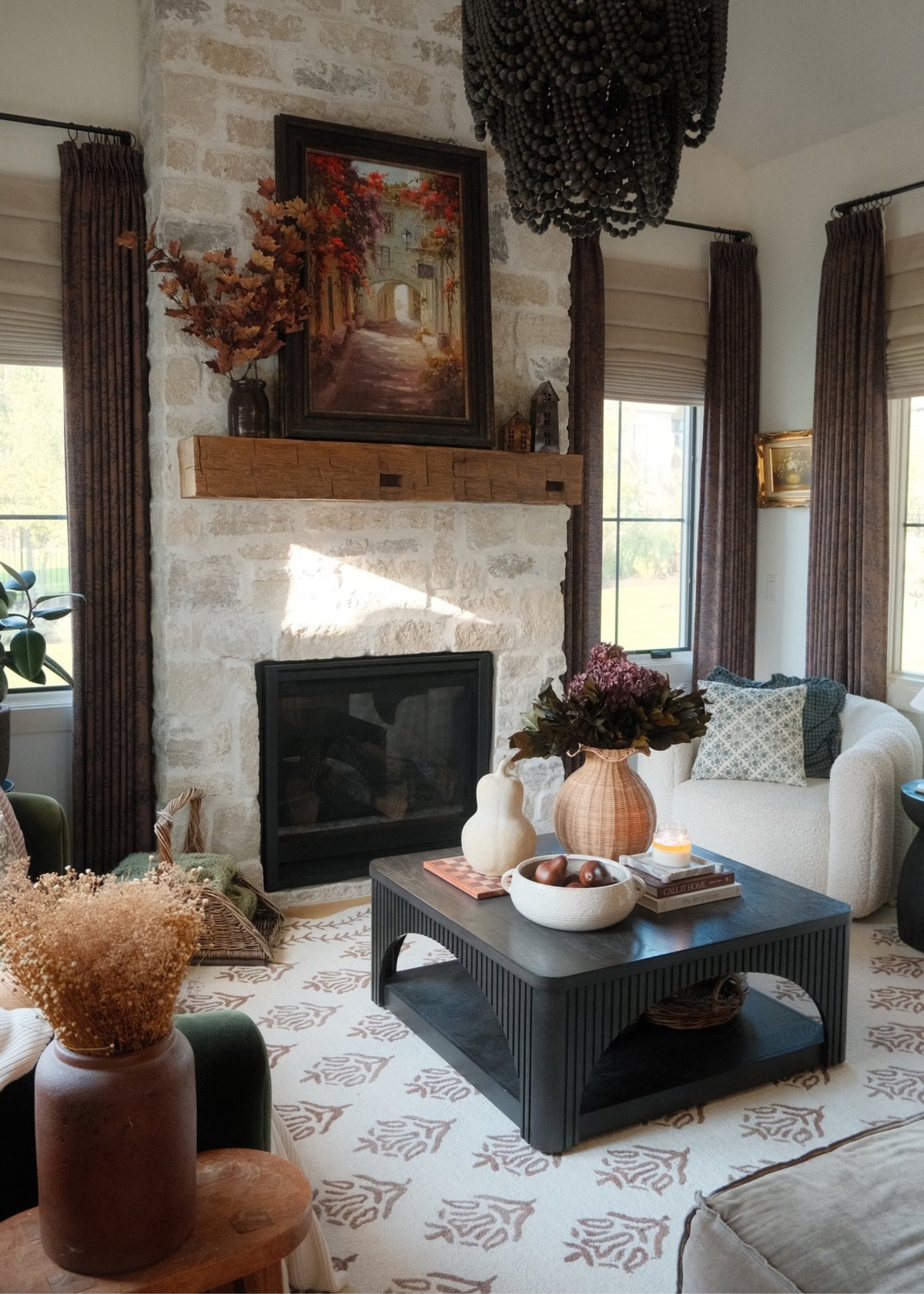 fall living room with faux hydrangeas and maple leaves