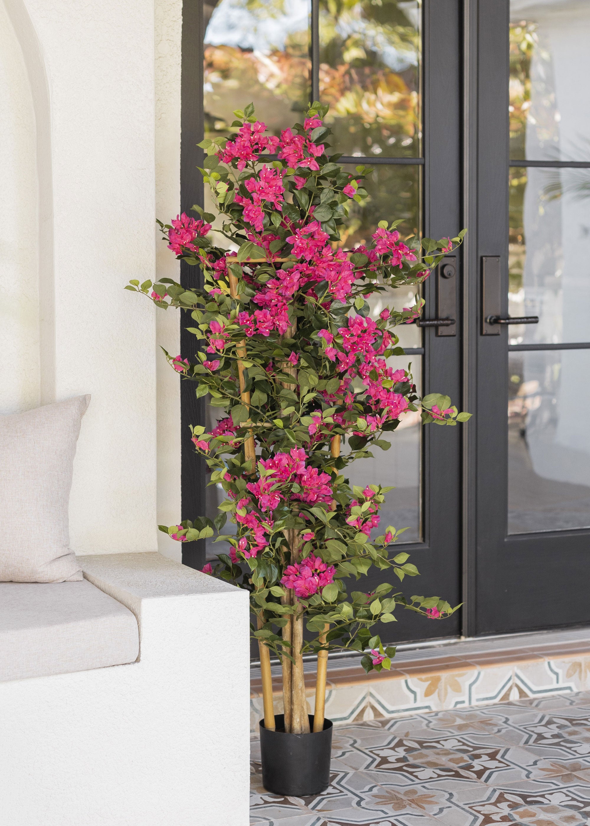 video of unpacking faux bougainvillea trellis potted plant