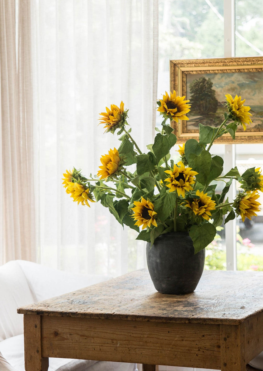 Artificial Sunflowers Arranged in Concrete Vase