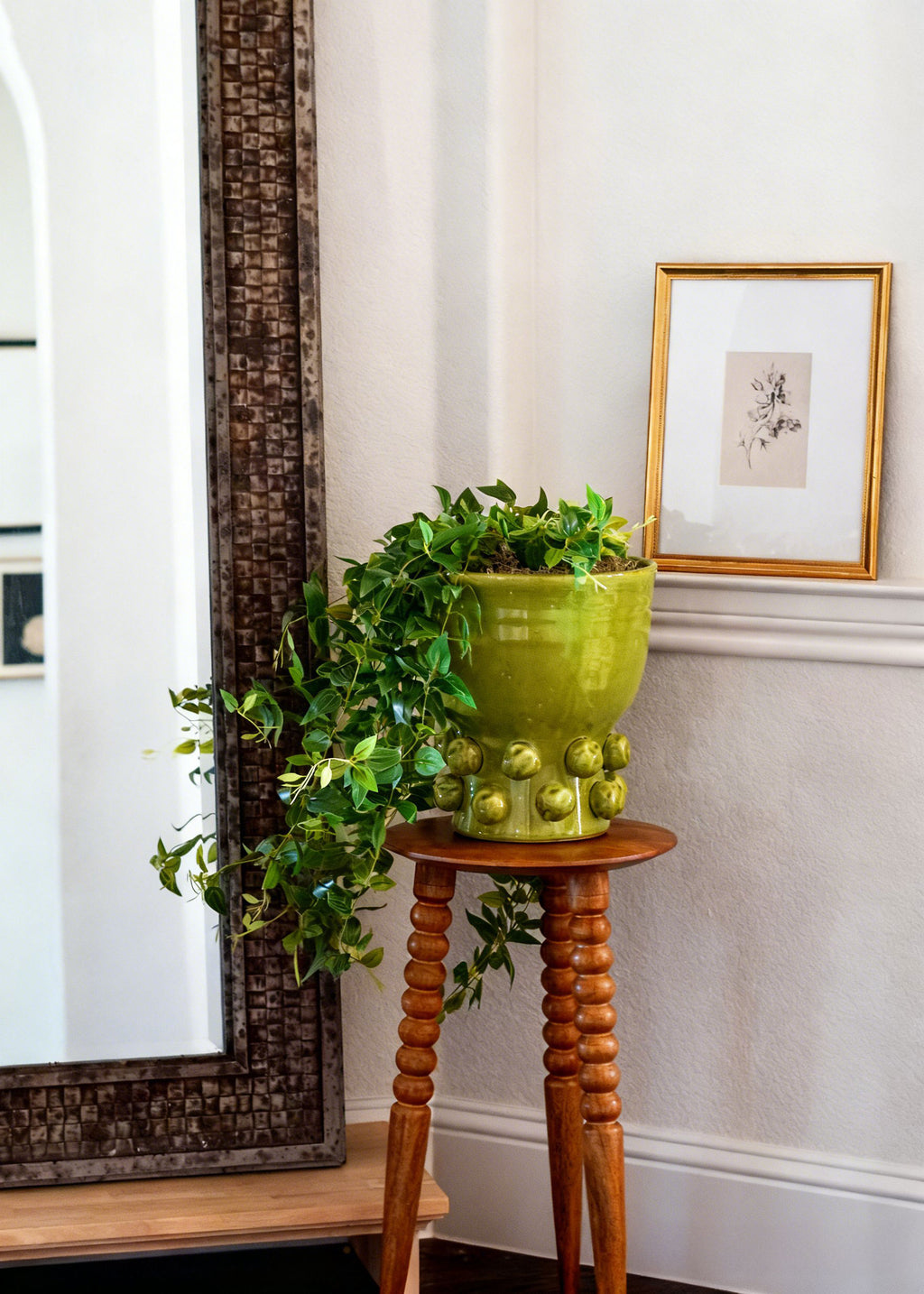 artificial tradescantia plant in green hobnail pot