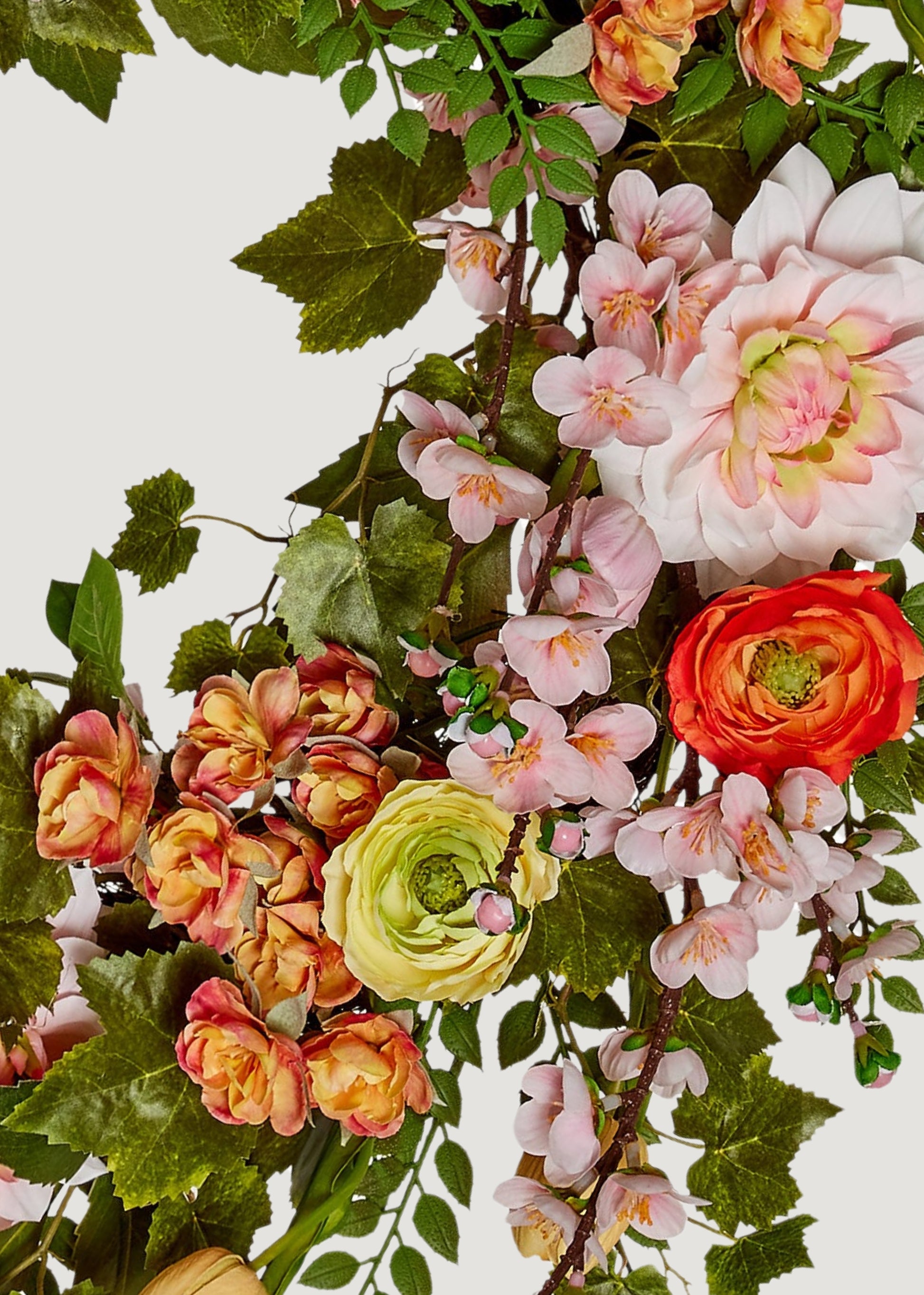 Close-up of silk flower garden wreath