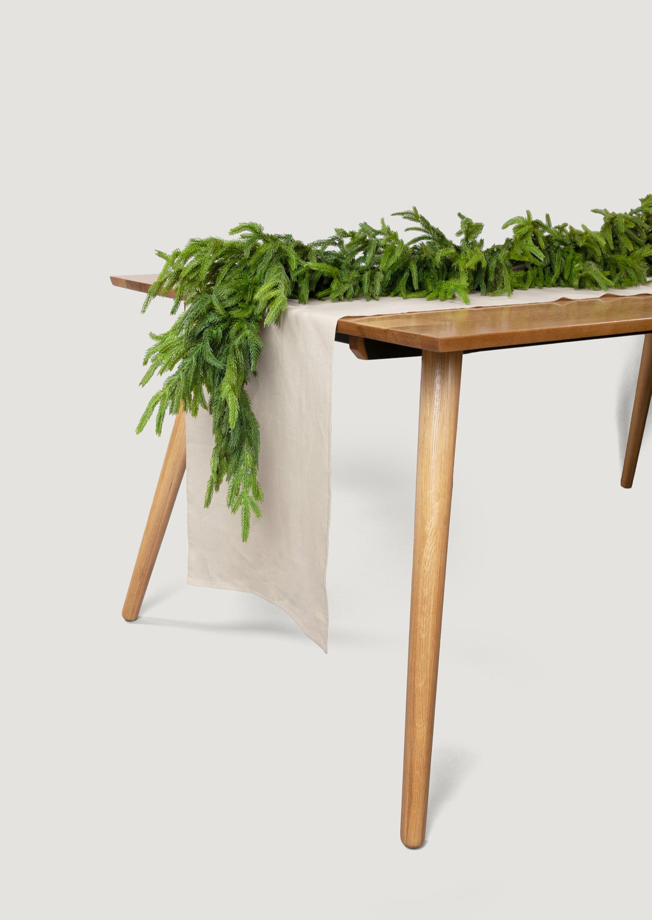 Deluxe Norfolk Garland on Table Runner