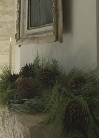 Afloral Deluxe Full Faux Pine and Cone Garland on Mantel