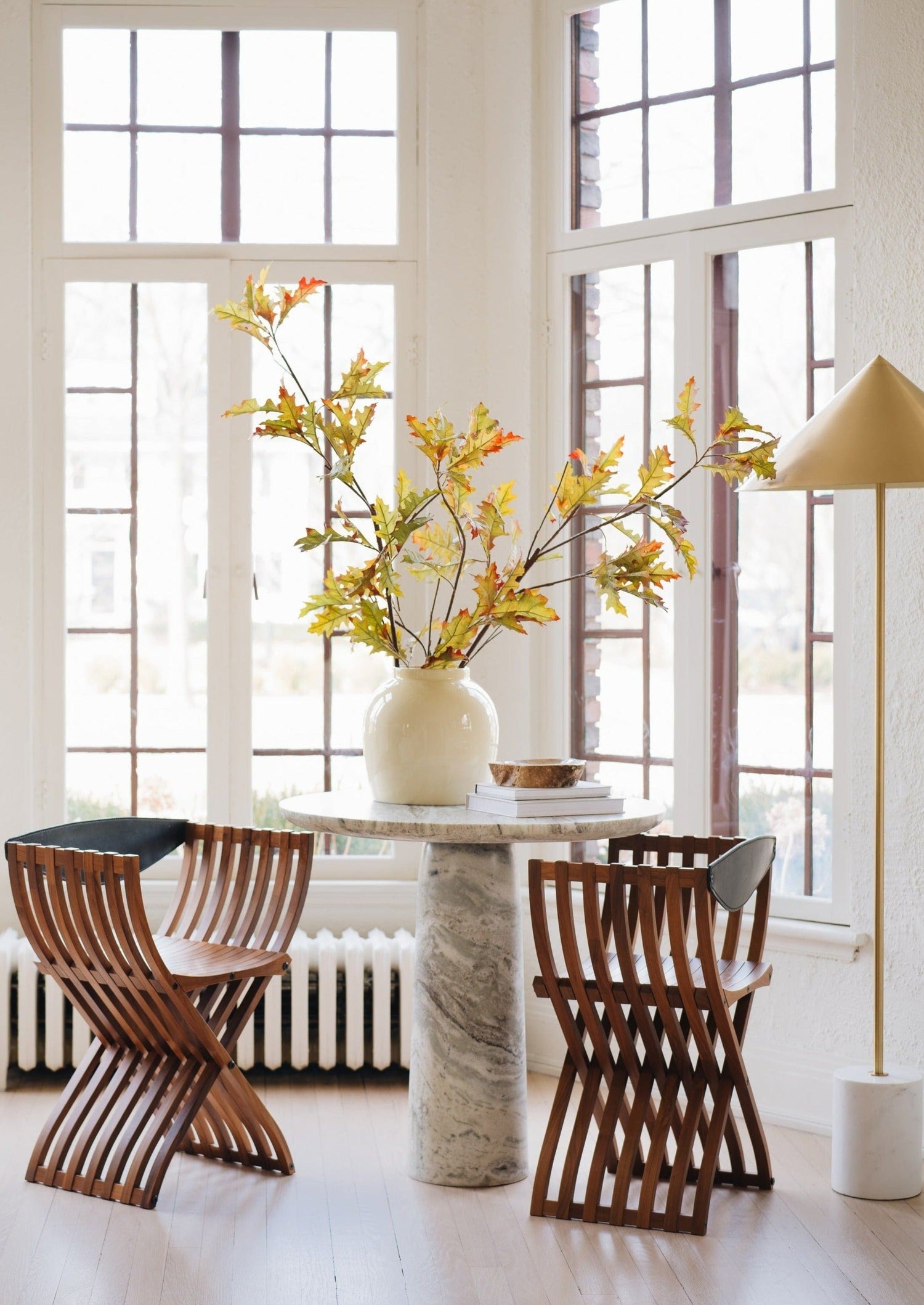 Artificial Oak Leaf Branch Styled in Vase on Side Table