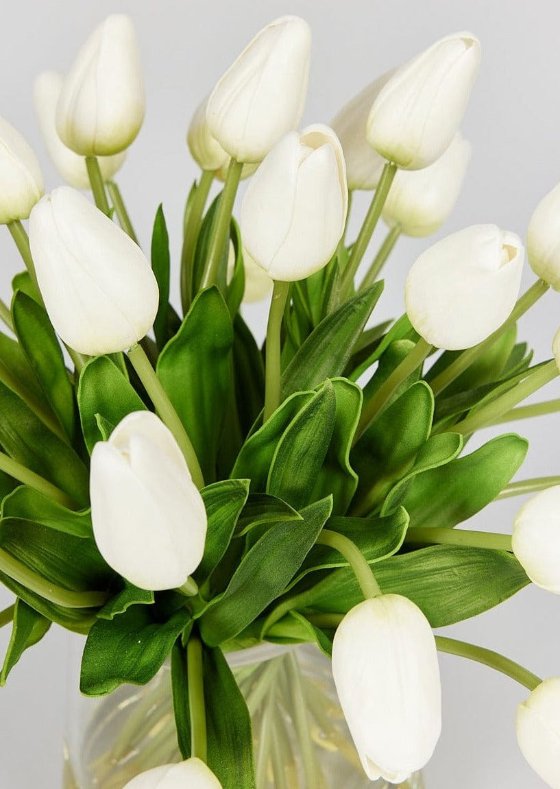 Close Up of Artificial White Tulips in Glass Vase at Afloral
