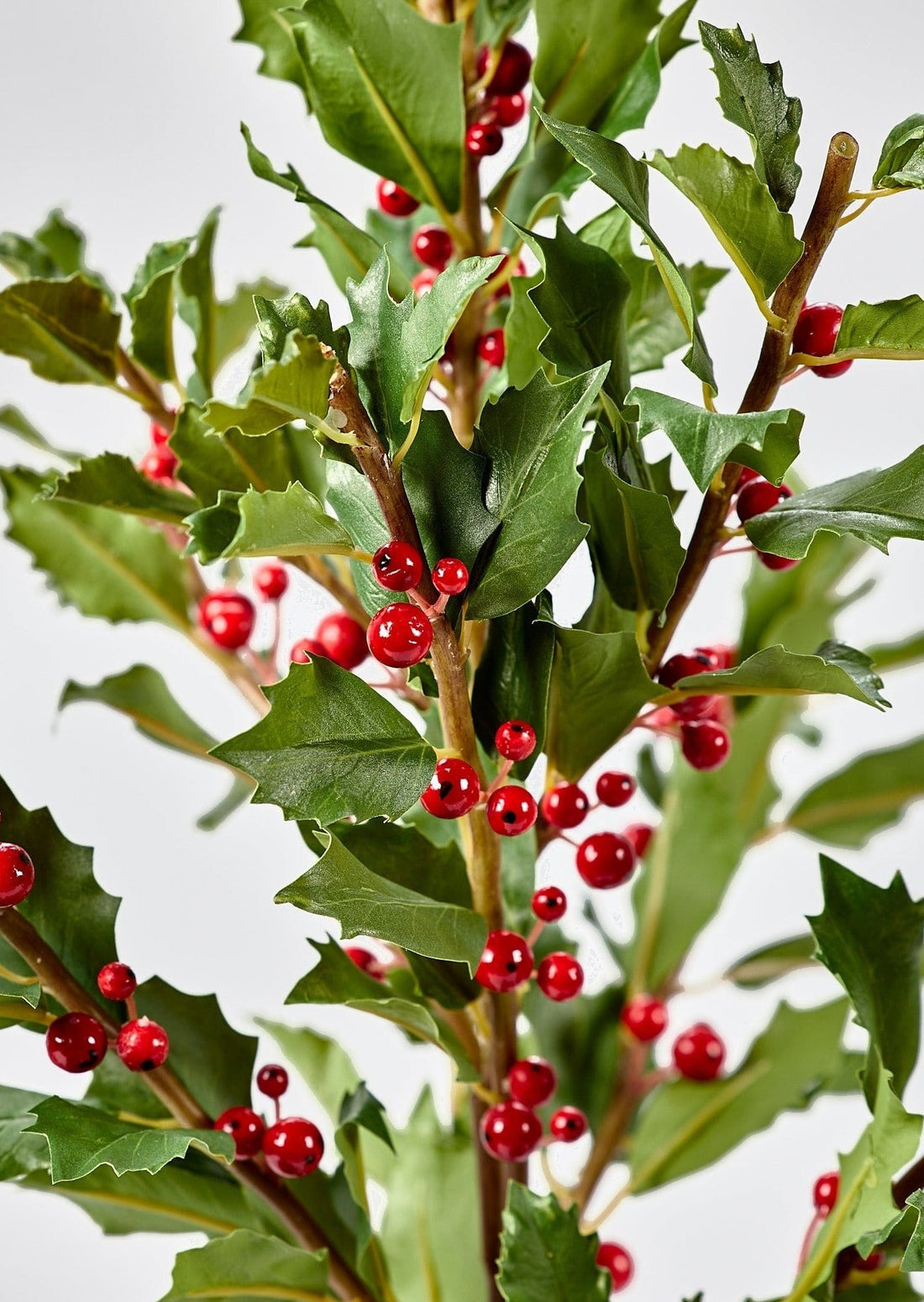 Close Up View of Afloral Faux Holly and Red Berry Branch
