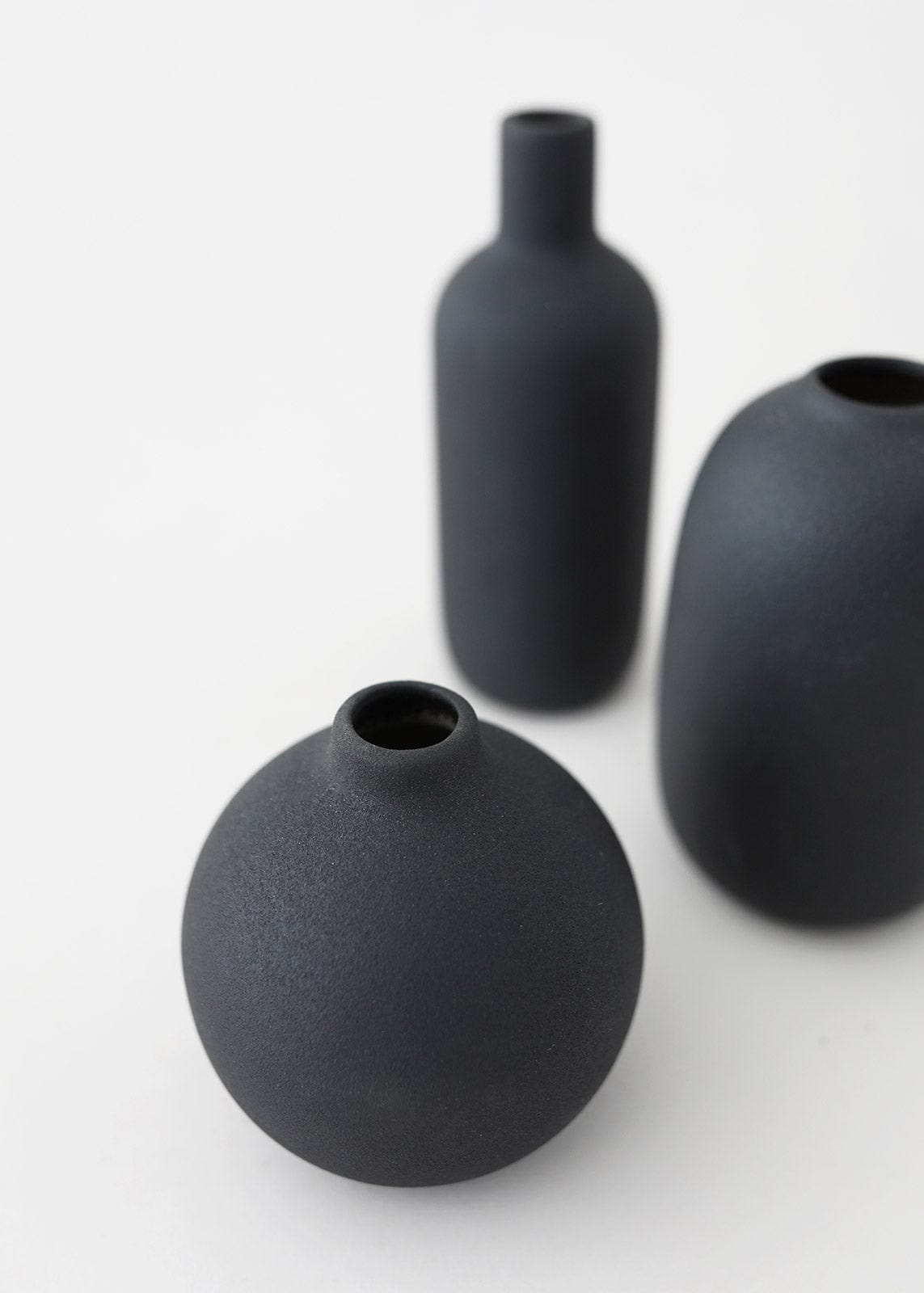 Opening of Black Ceramic Vase at Afloral