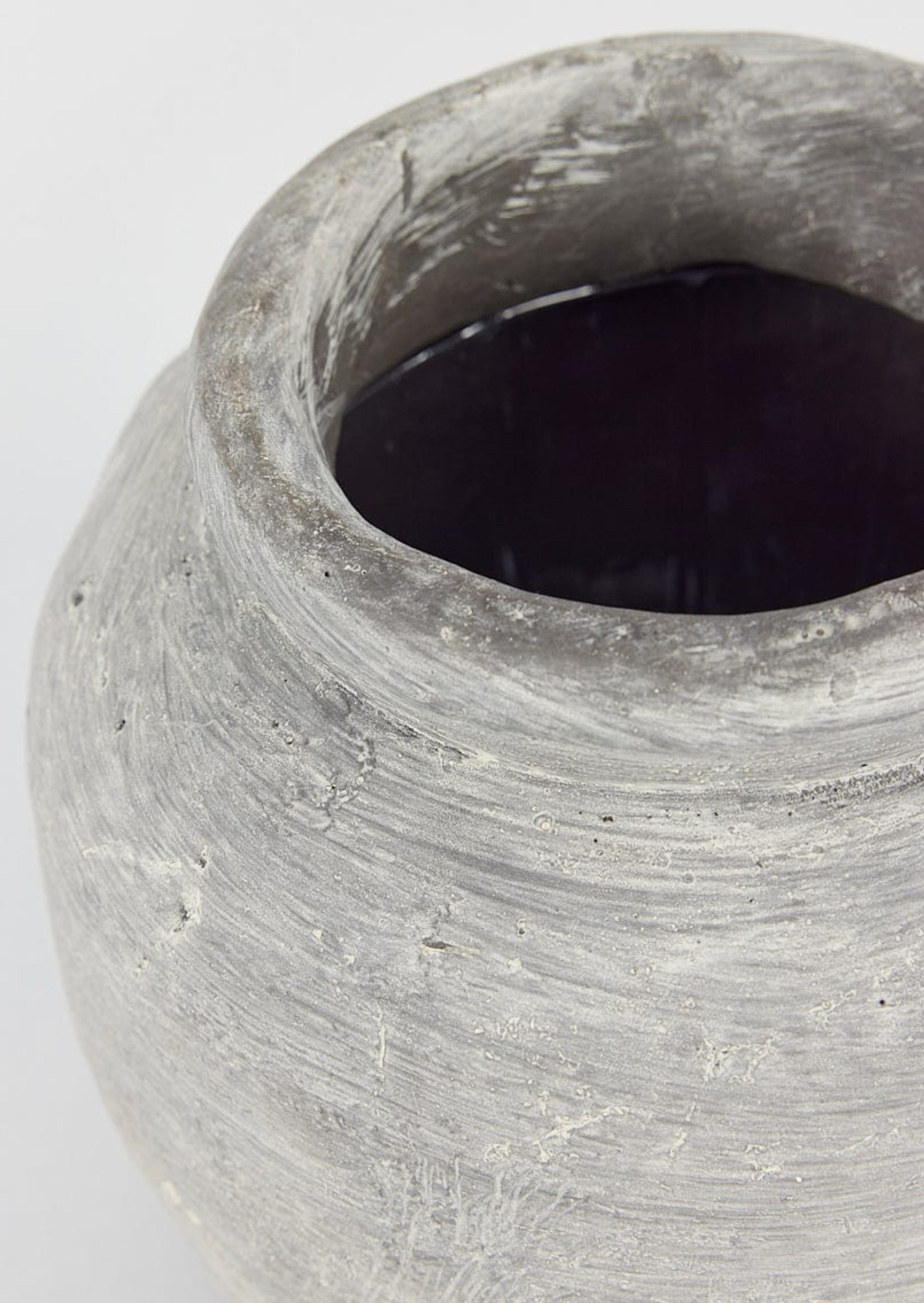 Afloral Close Up of Distressed Concrete Clay Vase