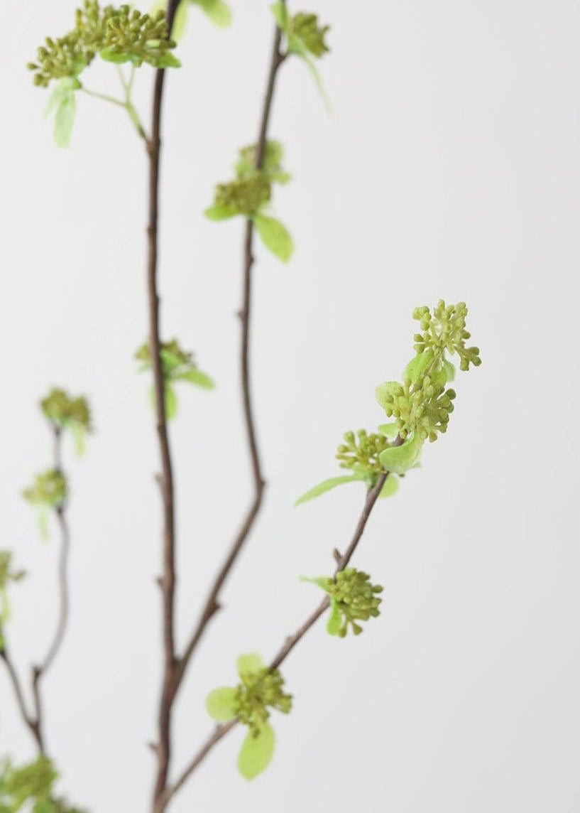 Green Budding Branch Faux Flowers at Afloral