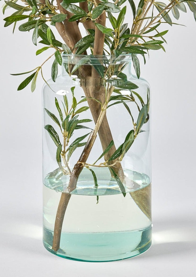 Close Up of Glass Vase and Acrylic Water Olive Branch Arrangement at afloral