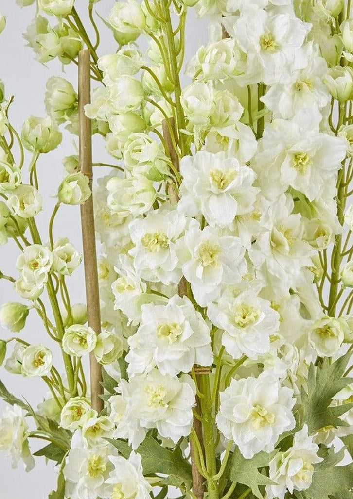 White Faux Delphinium Flowers in Potted Plant at Afloral