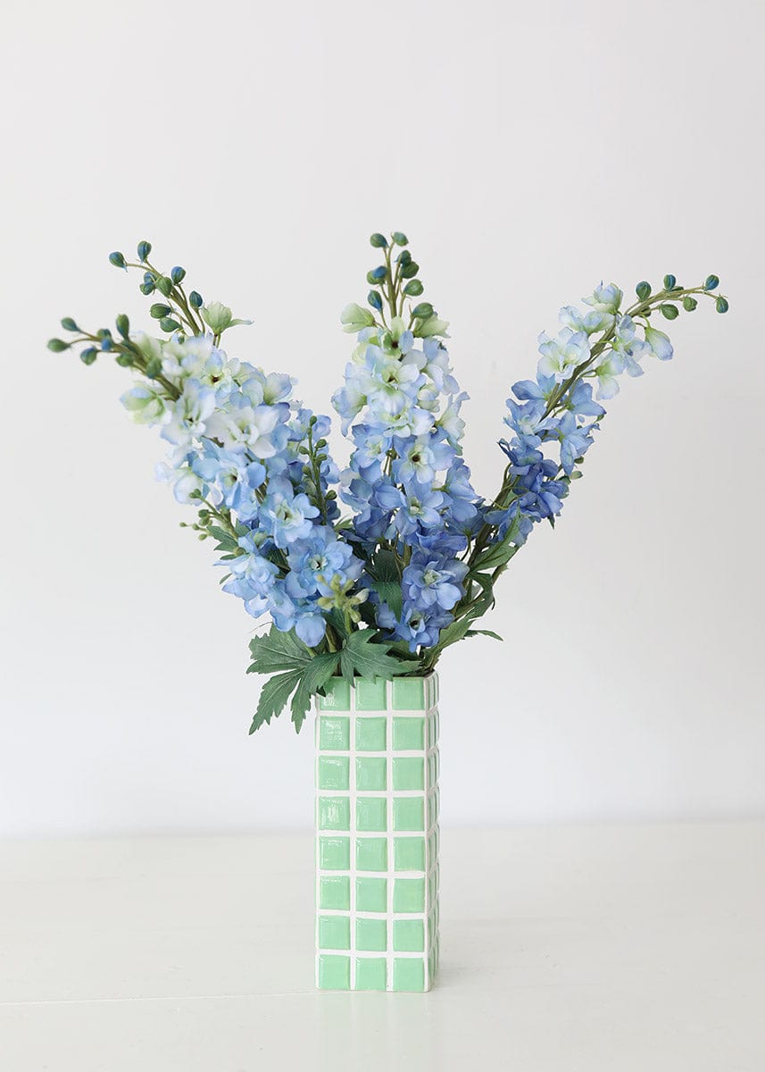 Artificial Delphiniums in Green Tile Vase