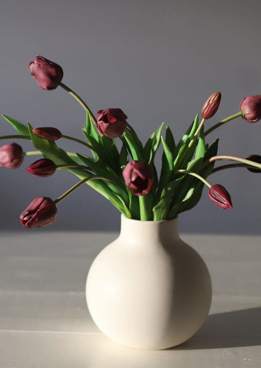 Bundle of Plum Tulips in Round Vase