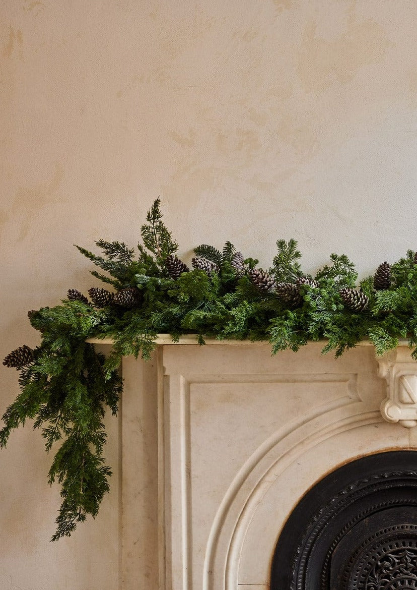 Artificial Holiday Real Touch Spruce Garland with Pinecones at afloral