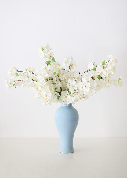 Blue Glossy Vase with White Cherry Blossoms