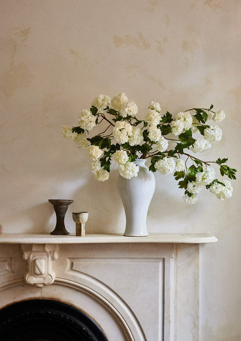 Cream White Snowball Flowers in Tall White Ginger Jar at afloral