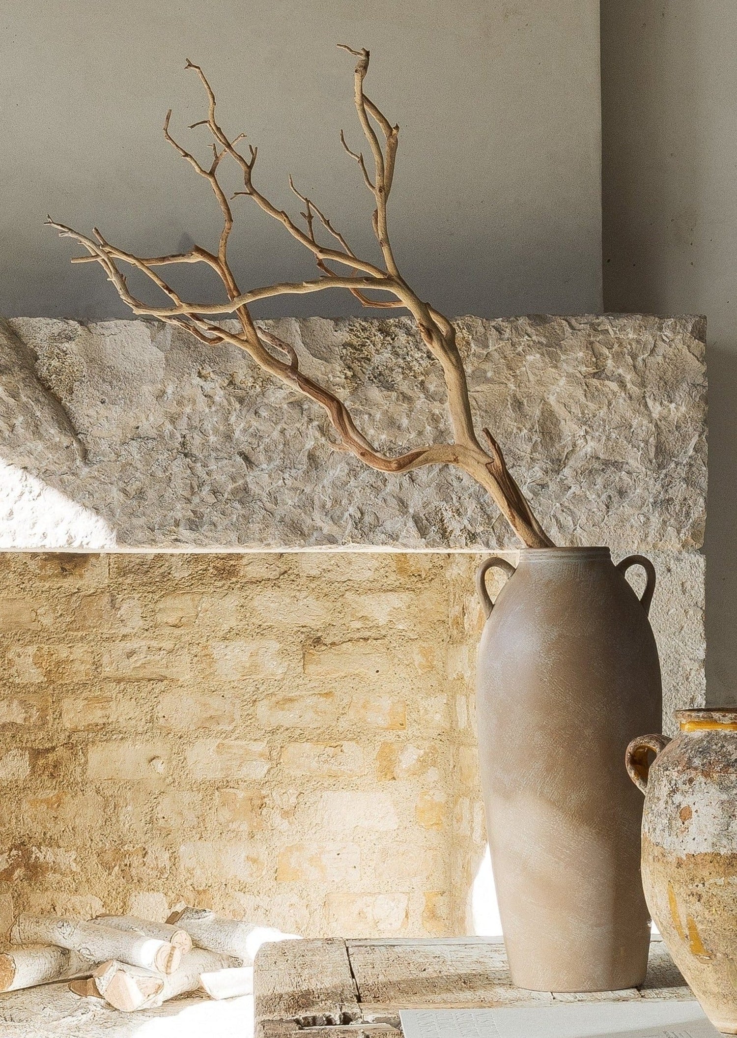 Tall Terra Cotta Handled Vase with Manzanita Branch at afloral